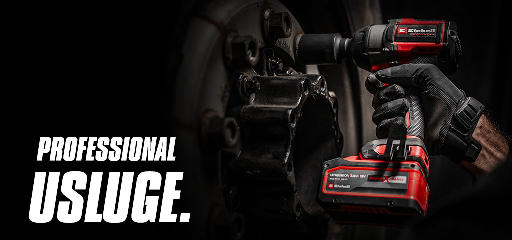 Close-up of a red cordless impact wrench being used on a wheel, with the text "Professional Services".