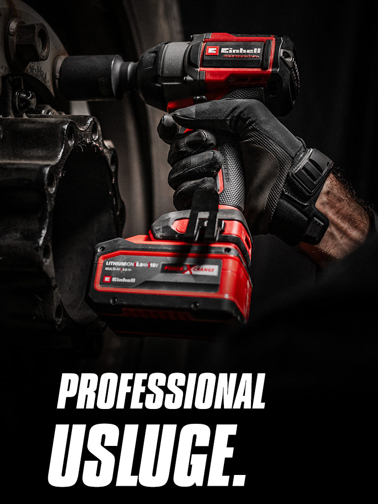 Close-up of a red cordless impact wrench being used on a wheel, with the text "Professional Services".
