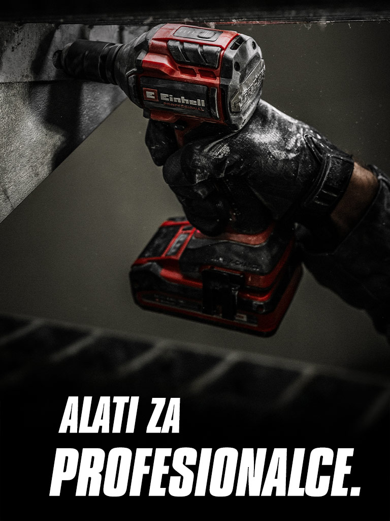 A hand holds a red cordless impact wrench being used on a metal beam, with the text "Power Tools for Pros".