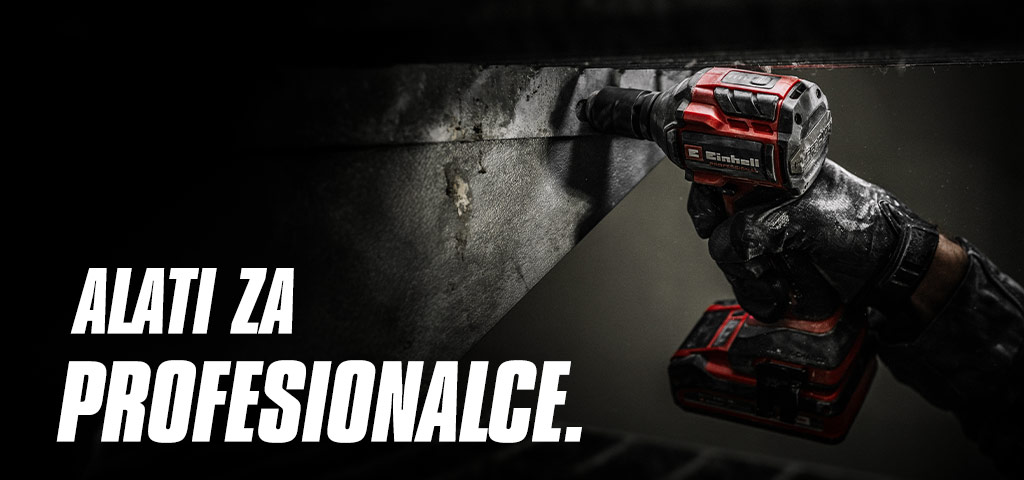 A hand holds a red cordless impact wrench being used on a metal beam, with the text "Power Tools for Pros".