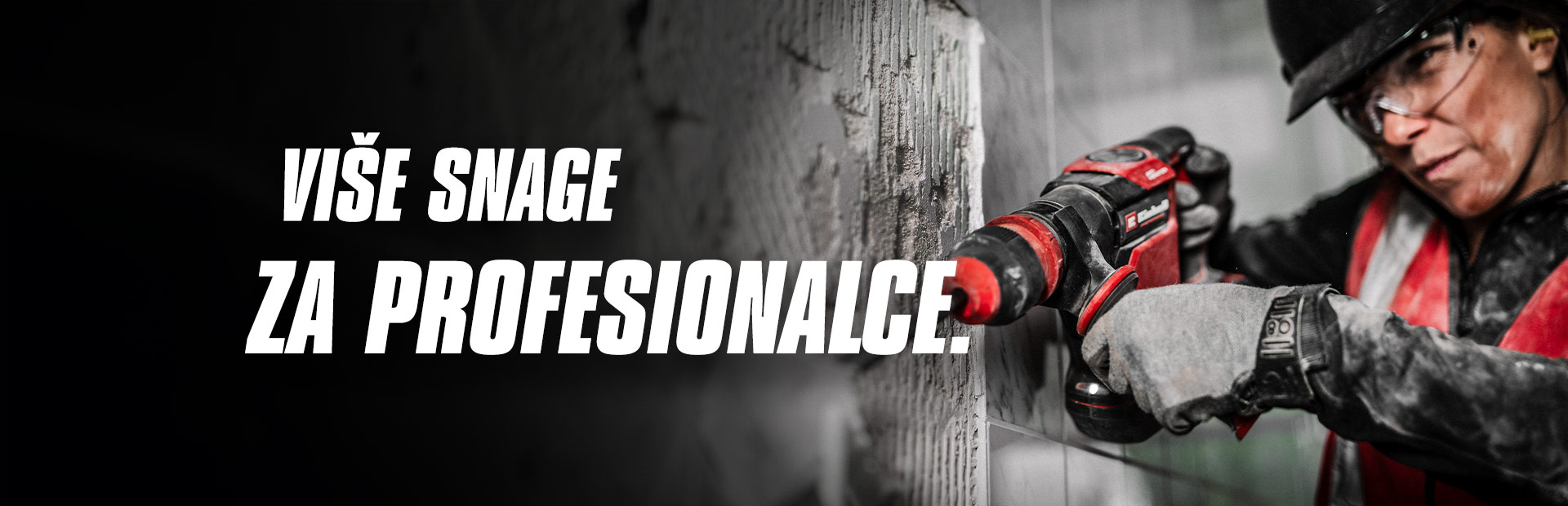 A person wearing safety glasses and a helmet uses a red drill on a wall, with the text "More Power for Pros".