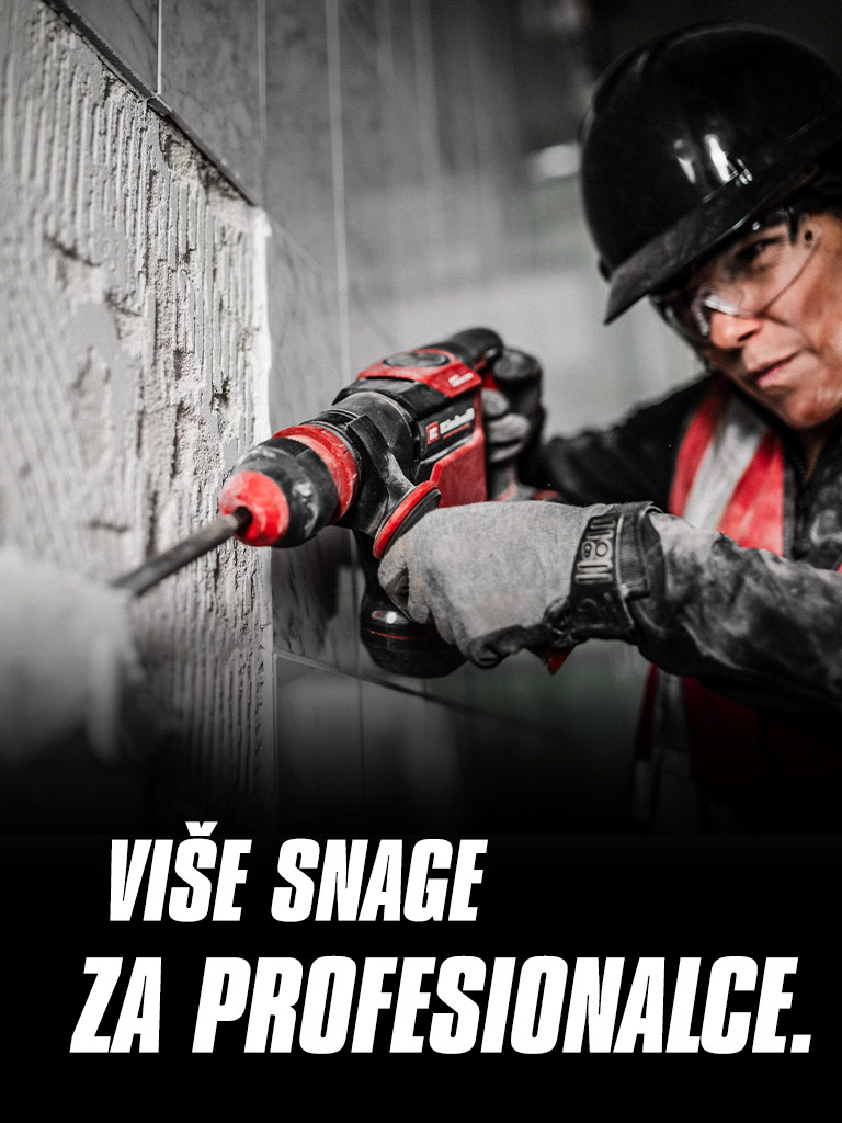 A person wearing safety glasses and a helmet uses a red drill on a wall, with the text "More Power for Pros".